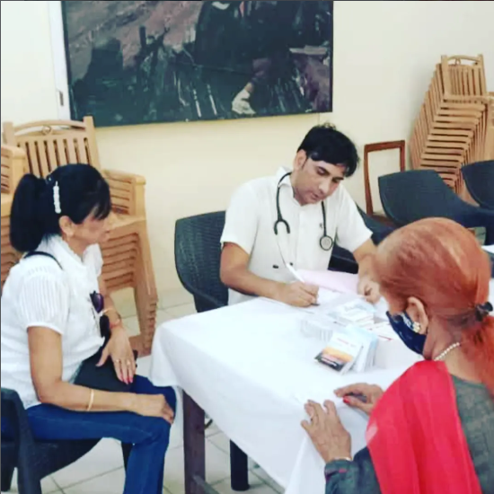 Dr. Hasib with patient